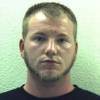 Armed Drug Smuggler Arrested