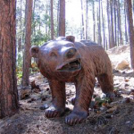 Bear statue weighs over 200 lbs and stands about 5' 